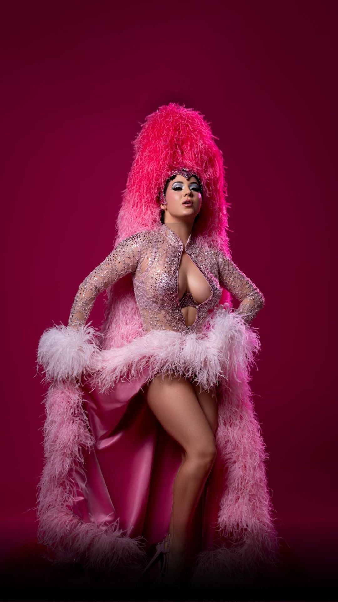 Women wearing pink feather boa