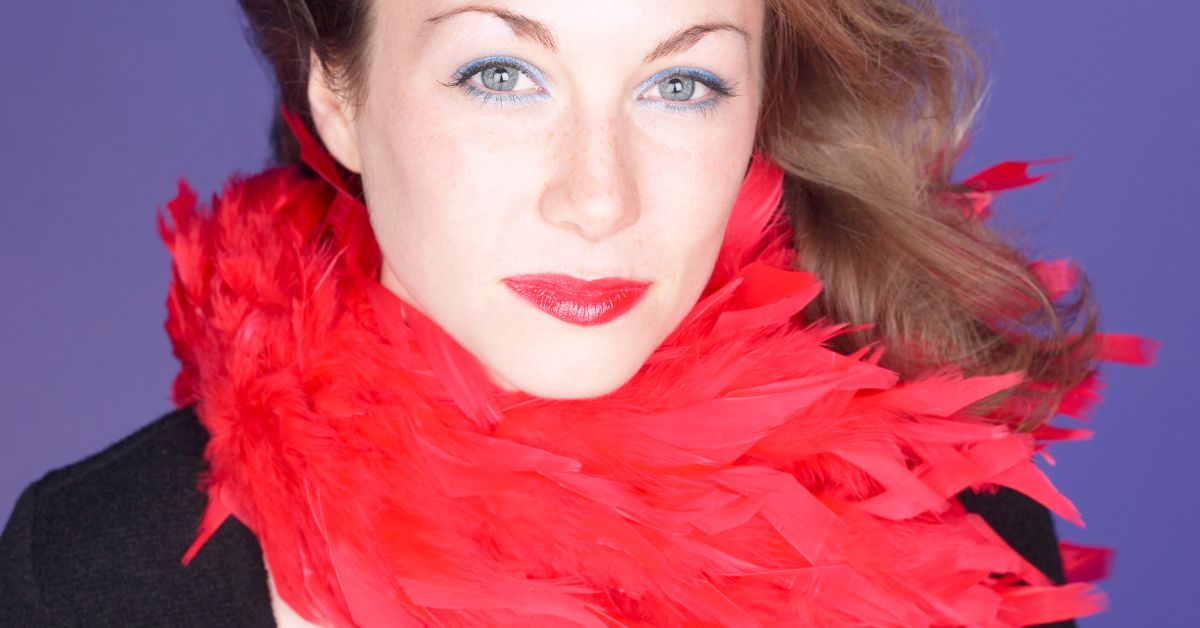 Woman wearing a red feather boas
