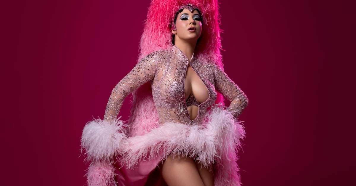 Woman with pink feather boa